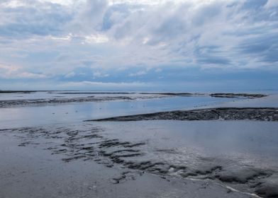 low tide blue sky