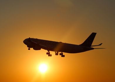 Airplane takeoff in sunset