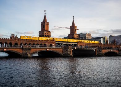 Yellow train on bridge