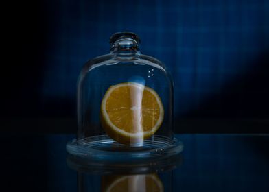 Half lemon in a glass