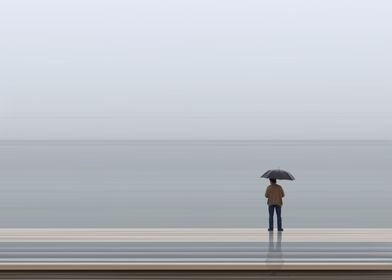 Man in rain with umbrella