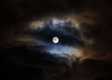 Moon surrounded by clouds