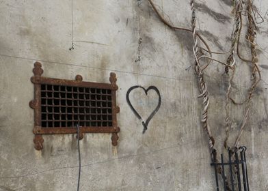 heart grafitti old window