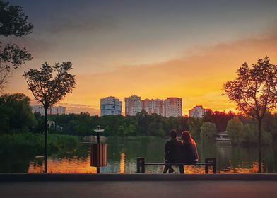 young couple meets sunset