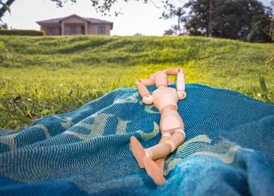 Manikin relaxing outdoors