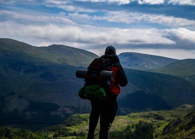 Person On Top Of Mountain