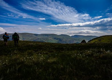 Two People Hiking Mountain