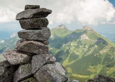 Stack Of Rocks Cloudy Moun