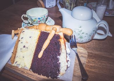 Manikin eating cake