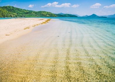 Sandy Bank With Clear Blue