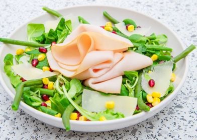 salad and ham slices