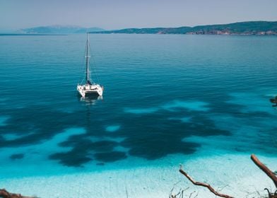 White Catamaran Yacht At A