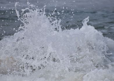 wave crashing on a rock