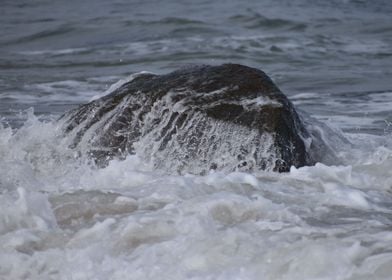 water cascading off a rock