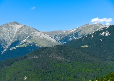 Mountain behind the green