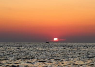 Sail boat at sunset