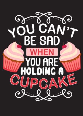 Holding Cupcake