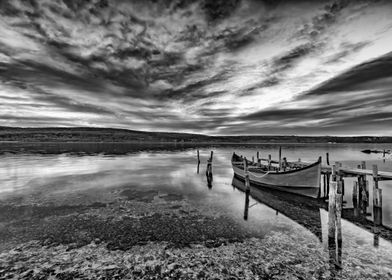 wooden pier and boat