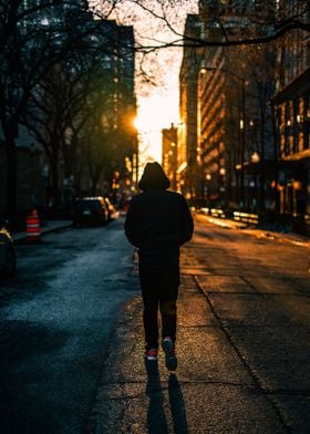 MAN WALKING ON THE STREET