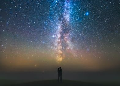 Couple against Milky way 