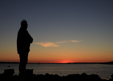 Man in the sunset shadow