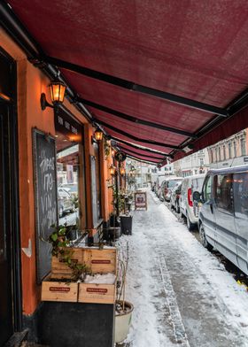 orange cafe in snowy day