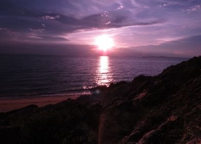 sun purple beach cloud