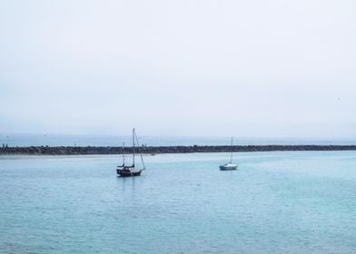 two boat blue beach cloud