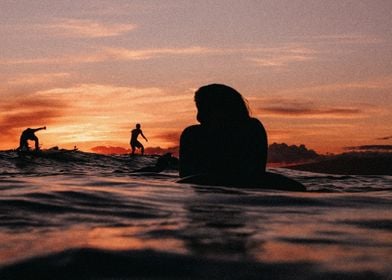 swimming sunset people sea