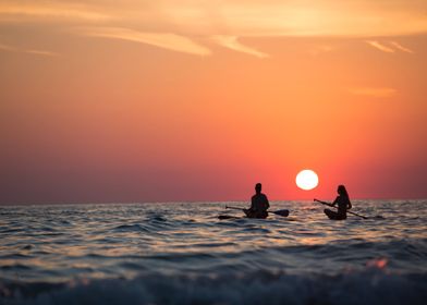 two people boat beach