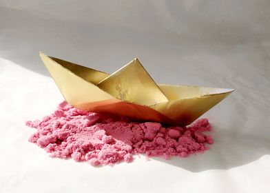 Gold paper boat