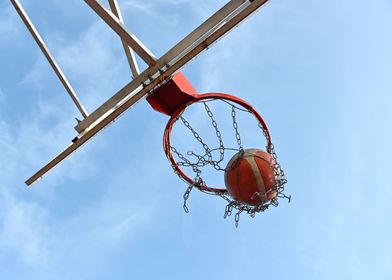 Basketball ball in hoop