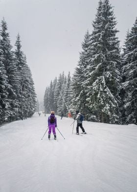 People skiing on slope