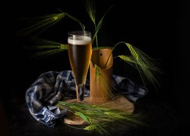 Green barley ears and beer