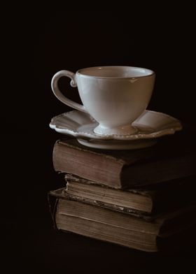 Cup and books