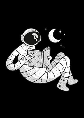 Astronaut reading a book