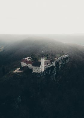 Castle on moody mountain