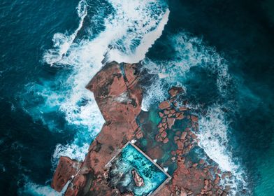 Pool surrounded by sea