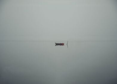 Boat on foggy sea