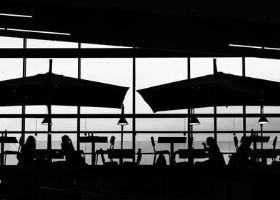 Silhouettes In A Cafe