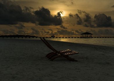 Wooden chairs on the beach