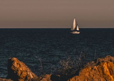 Sailboat leaving port