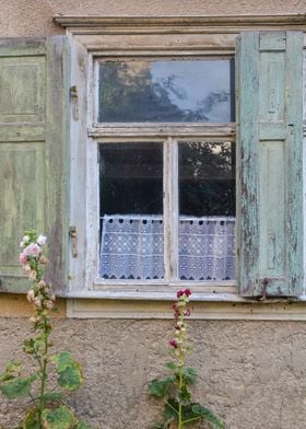 Old window with shutters