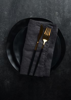 Cutlery and black plate