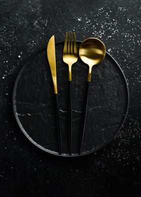 Cutlery and black plate