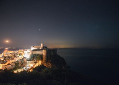 Night sky stars over sea