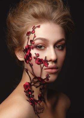 Young woman with flower ma