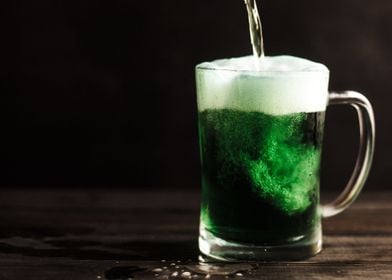 a glass of green beer