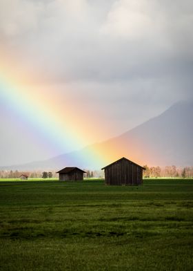 Rainbow behind little hut