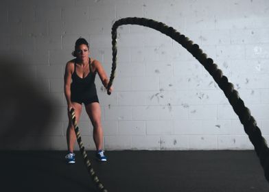 Woman Using Exercise Ropes